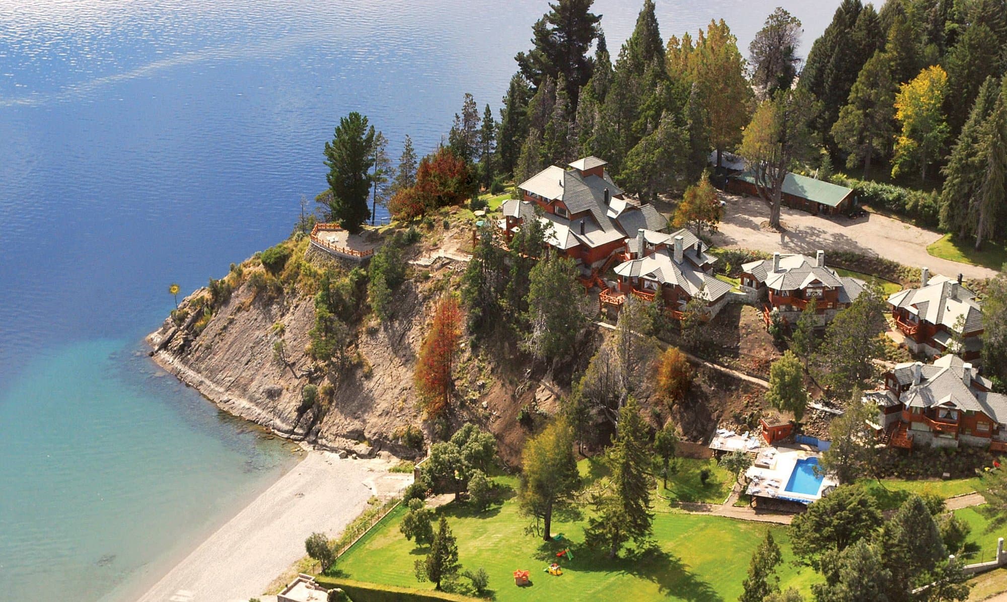 Lakeside buildings surrounded by forests in Northern Patagonia